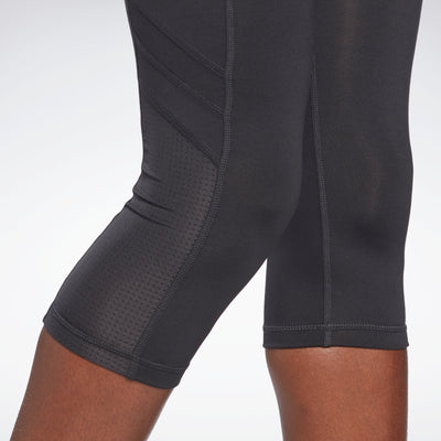 Reebok Women's Skinny Capri High Rise Leggings w/ Mesh pockets (Medium)  mujer